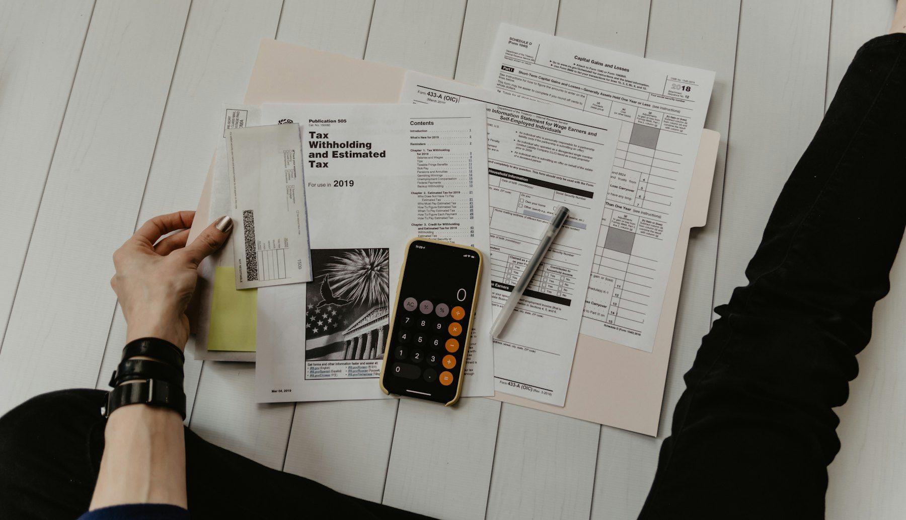 A printed report and a pen on a desk.